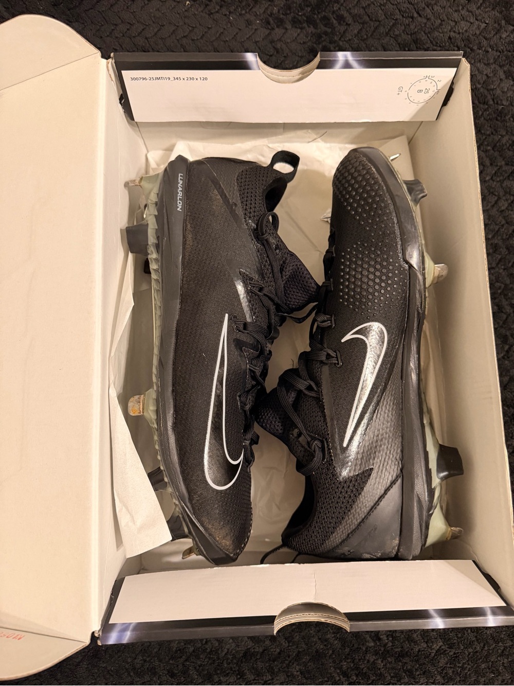 Nike Black Athletic Cleats with White Swoosh
